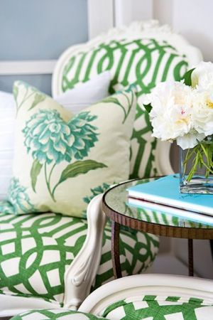 Beautiful green and white lattice pattern on armchairs with white peonies and floral teal cushions.jpg